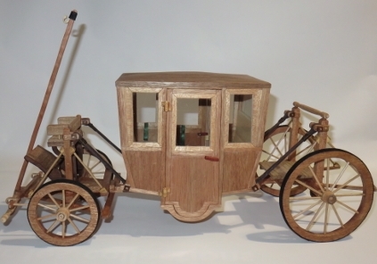 Maquette en bois à l'échelle 1/10e du carrosse à 5 sols réalisé par Mr René Geoffre ( Maquette visible dans l'espace Blaise Pascal du Musée Lecoq)
